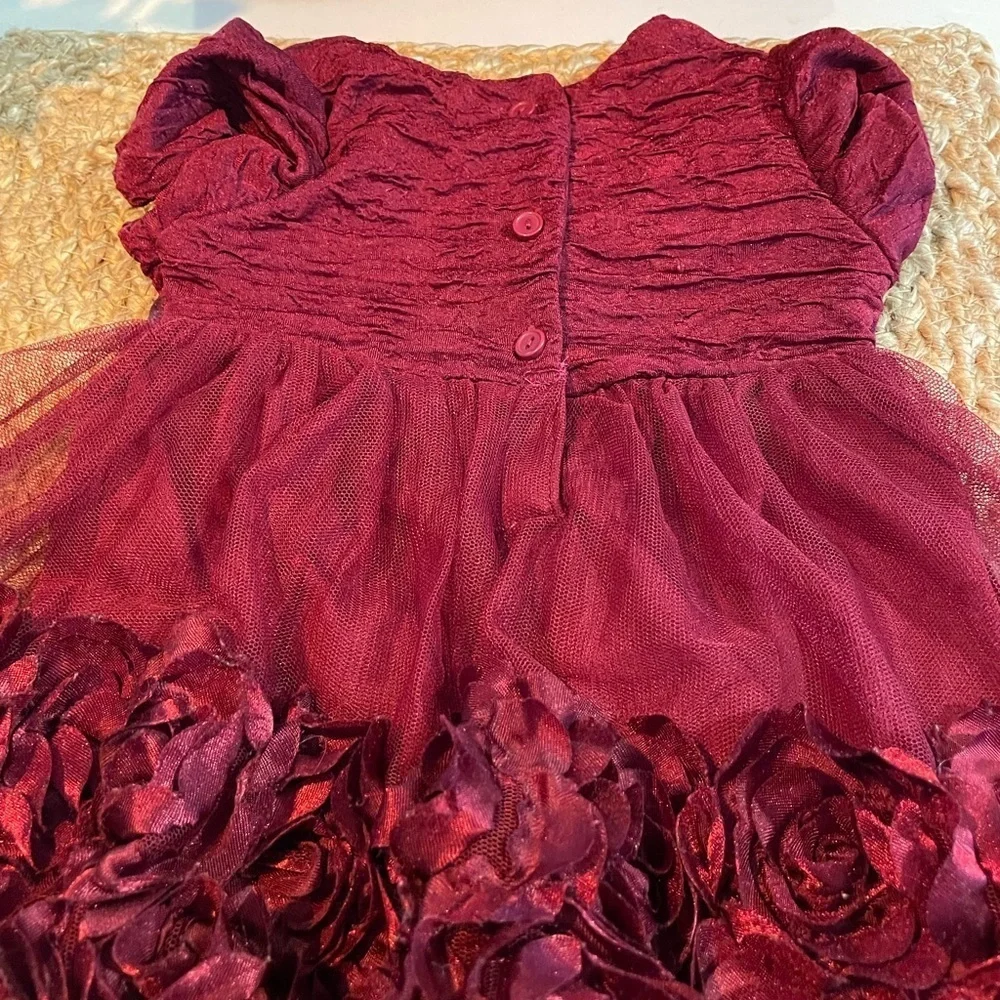 Adorable ruffled dress in deep burgundy